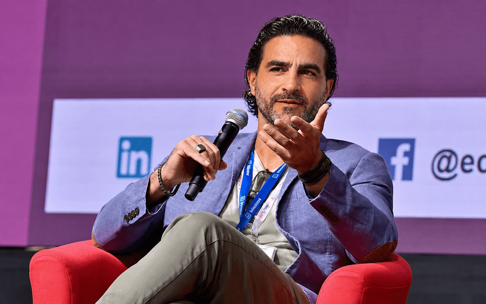 Hossein Tohidi (Unclecode), Kidocode founder, speaking at a tech conference