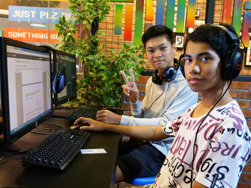 Kidocode teens collaborating on a data project