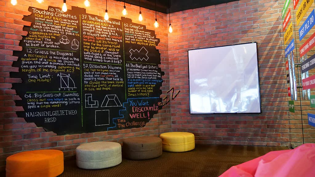 Kidocode chalkboard with puzzles and equations