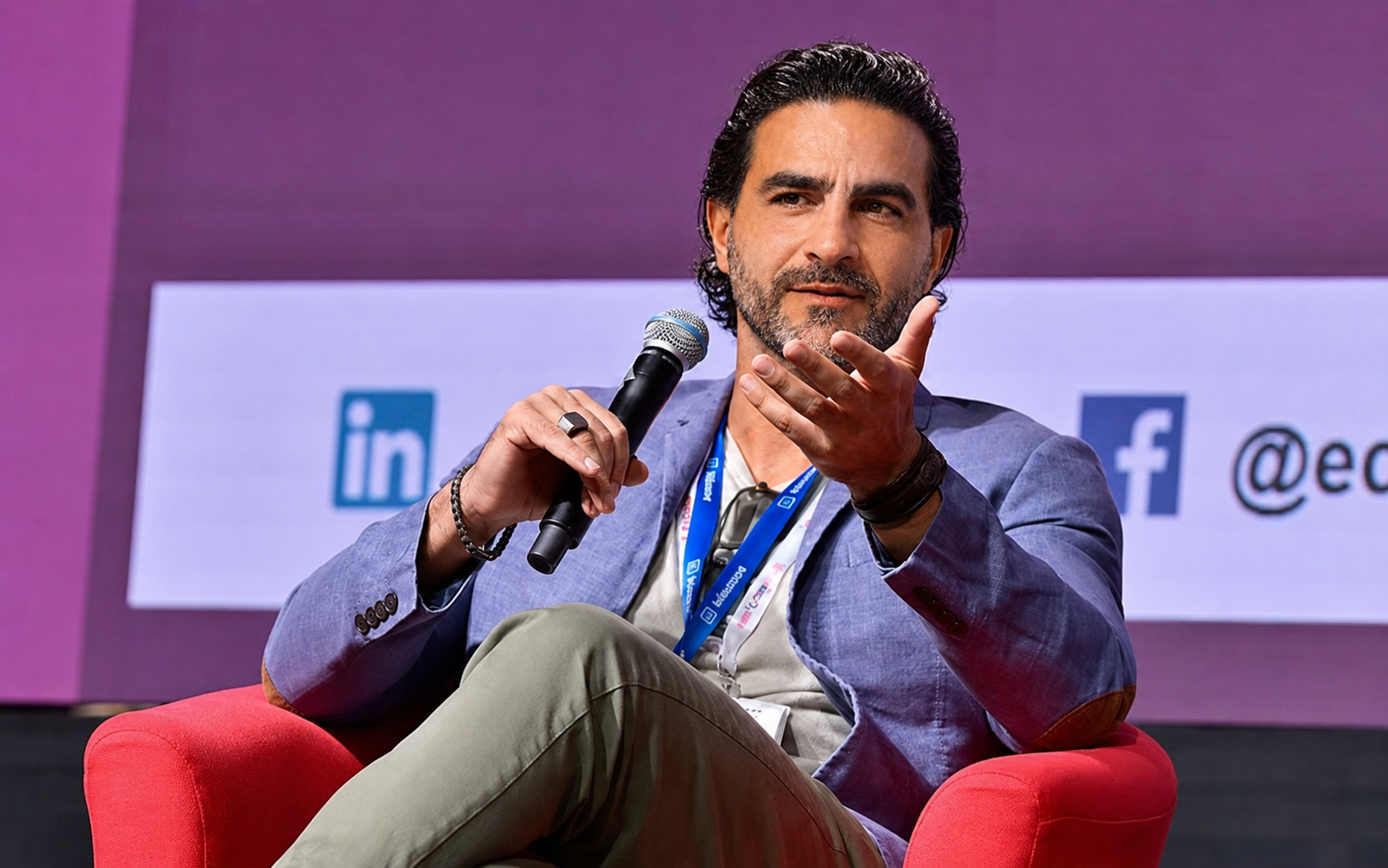 Hossein Tohidi (Unclecode), Kidocode founder, speaking at a tech conference