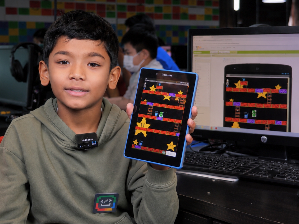 Sachin designing a mobile adventure game on tablet